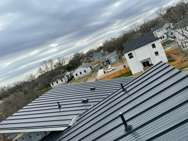Standing seam metal roof panels with vents for Skylight Repair in Harrington Park